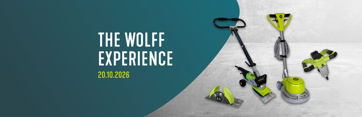A display of green and black flooring tools with the text The Wolff Experience 20.10.2026 on a teal and grey background.